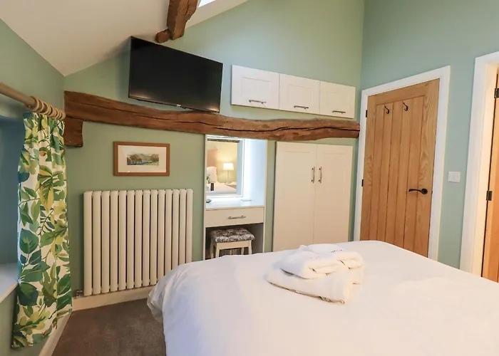 Old Howgate Barn Hébergement de vacances *